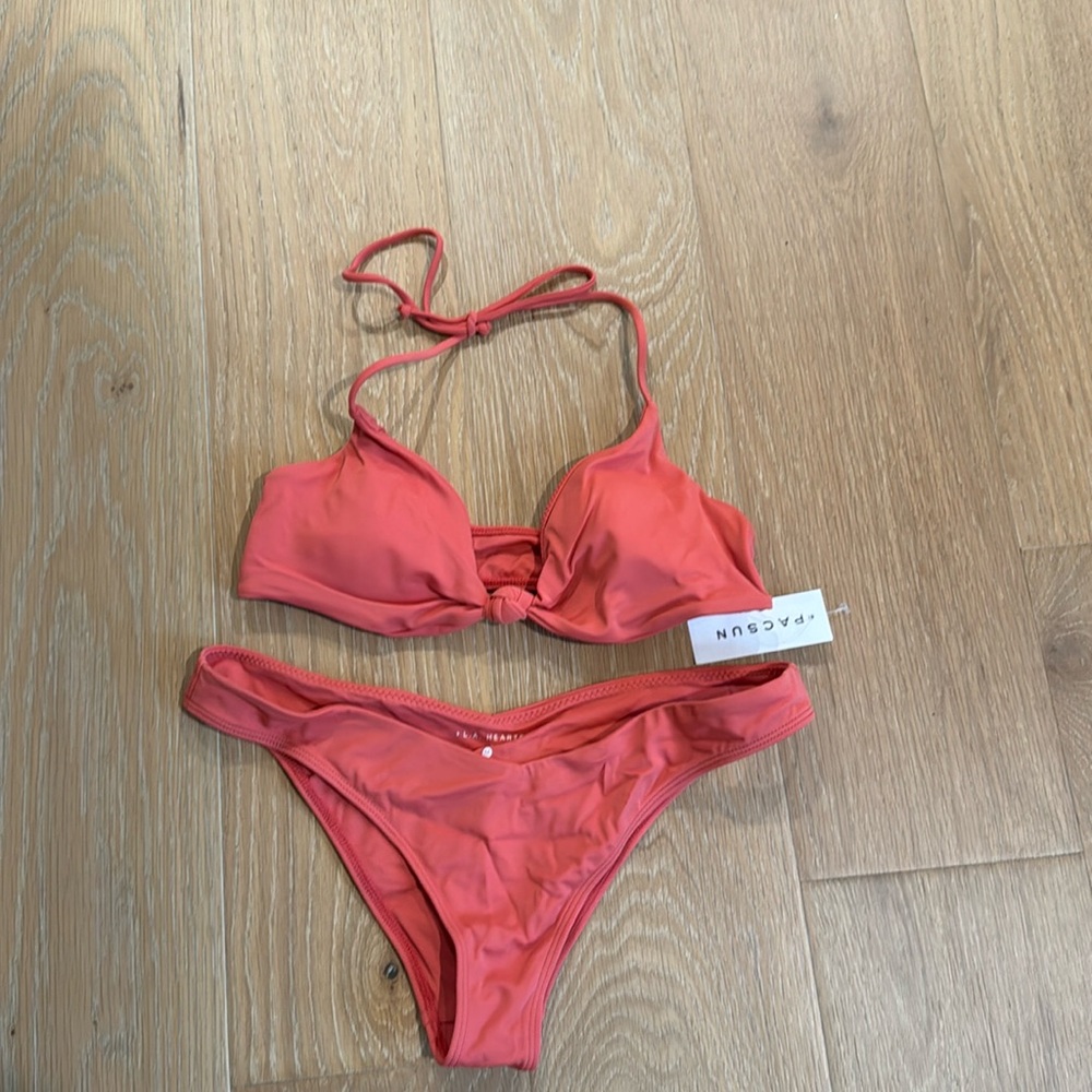 Small top, medium bottoms pacsun swim suit. Never worn